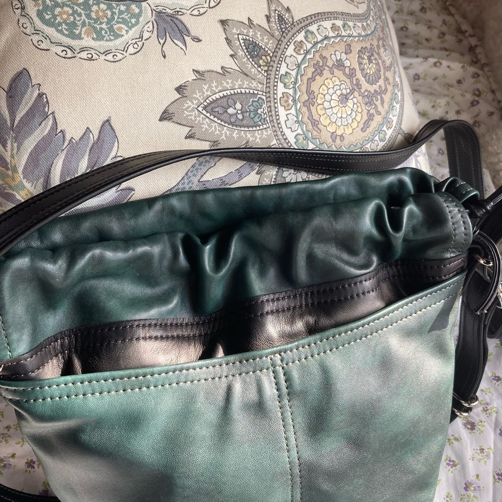 Rough & Tumble Baby Borough.  Jade Crush with maroon lining.